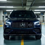 Mercedes-Benz GLC en stationnement souterrain d'entreprise, vue 3/4 avant sur fond de parking moderne